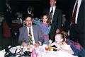 Joe and Angie Quattrochi at table with Mallory and Larry Box behind